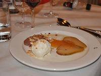 flamed pears  Flamed Pears: Birnenfilets im Smoker in Weisswein & Vanille gegart, an einer cremigen Apricotsauce, flambiert mit Grand Marnier, dazu ein Mousse au Choccolat, zartes Kokos Glacé mit gerösteten Kokosflocken.